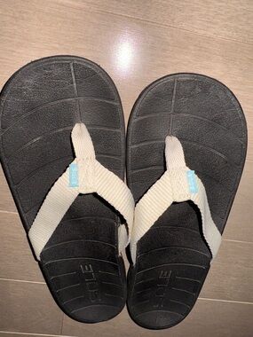 Women’s SOLE Black Flip-Flop Sandals with Cream Straps